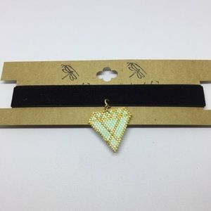 Beaded choker necklace with diamond shape charm